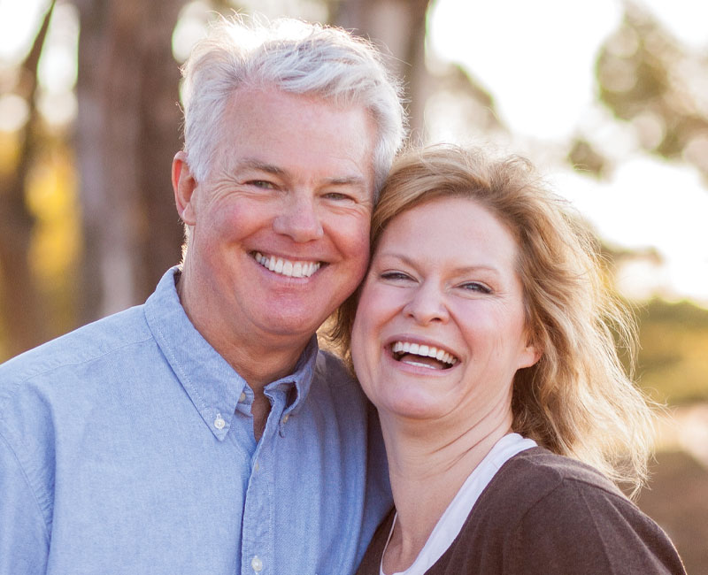 Smiling Senior Couple After Dental Cleaning from West Davis Dental Excellence Dallas TX